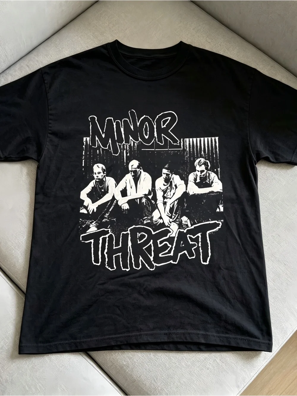 Minor Threat graphic of four men with the words 'MINOR THREAT' t-shirt Unisex